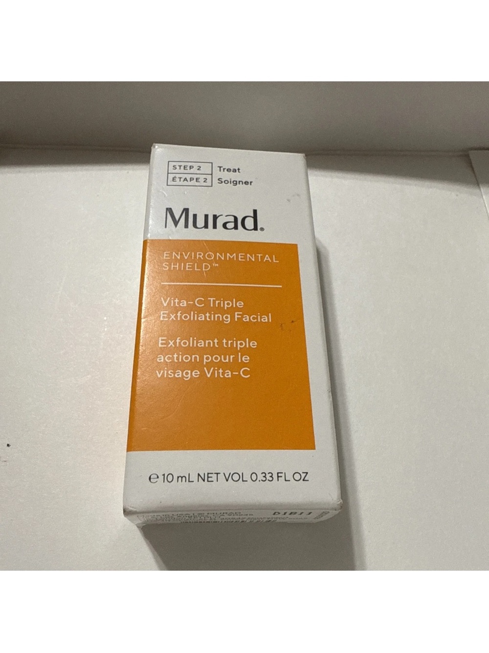Murad Vita-C Triple Exfoliating Facial Serum.